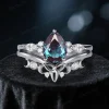 Pear-cut alexandrite engagement ring with Celtic knot wedding band set, color-changing gemstone for June birthdays