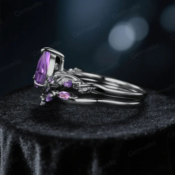 Low-profile nature-inspired ring set side angle showing intricate branch detailing and stone settings