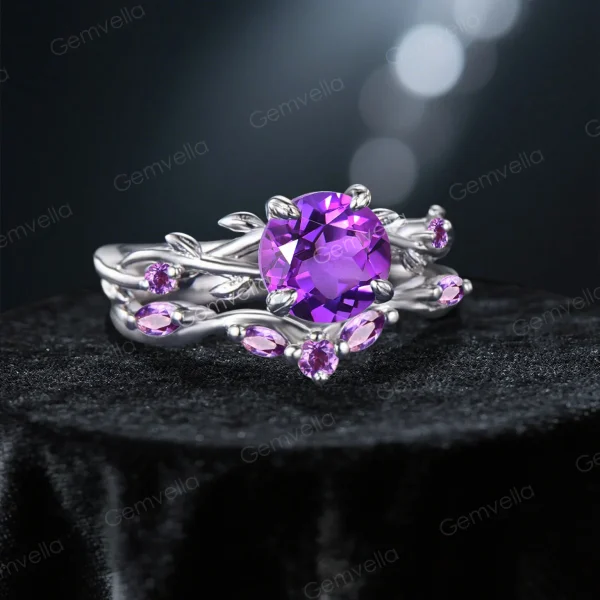 45-degree angle shot revealing the three-dimensional depth of the leaf and vine motif, the brilliance of the central Amethyst, and the rich violet hue of the surrounding Amethyst accents creating a monochromatic look.