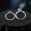 Overhead close-up looking directly down at the ring set, emphasizing the sturdy thickness of the silver band and the smooth interior finish designed for comfortable daily wear, with the arrangement of purple Amethysts visible.