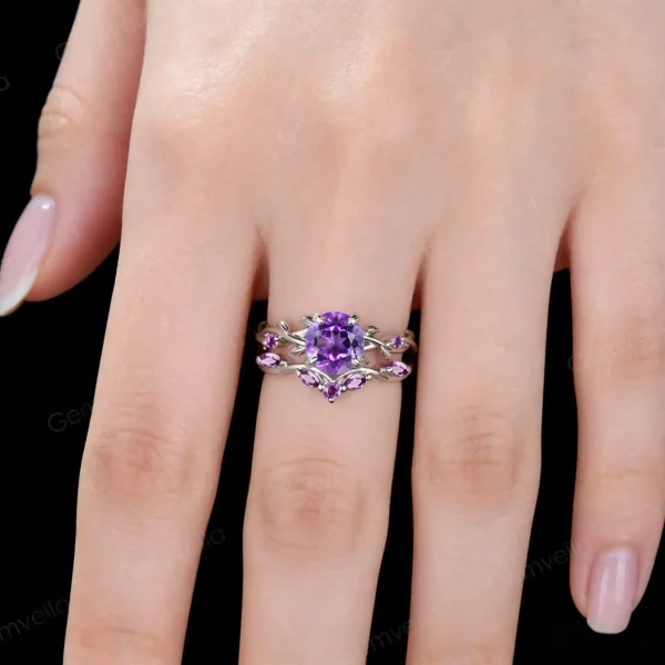 Lifestyle close-up of the vintage all Amethyst ring set worn on a woman's finger, demonstrating how the twisting vine design wraps elegantly around the hand and complements the skin tone with its rich purple sparkle.