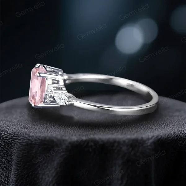 Side profile of handmade pink sapphire and moissanite ring showing band thickness and stone setting height