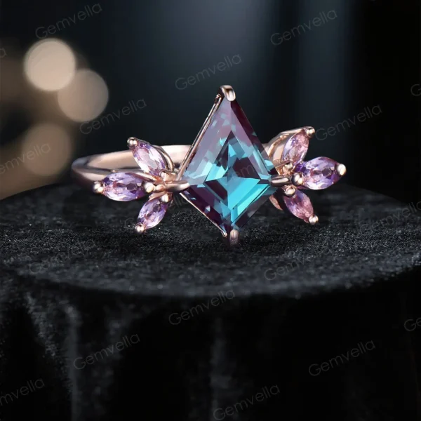 Angled view of art deco kite alexandrite and marquise amethyst cluster ring in 14k rose gold showing 3D perspective.