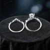 Overhead close-up looking directly down at the ring set, emphasizing the sturdy thickness of the silver band and the smooth interior finish designed for comfortable daily wear, with the Moss Agate and Emerald arrangement visible.