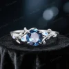 Sterling silver variant of the 1ct London Blue Topaz and Moonstone ring, showcasing the classic vintage design and round birthstone centerpiece in a polished silver tone.