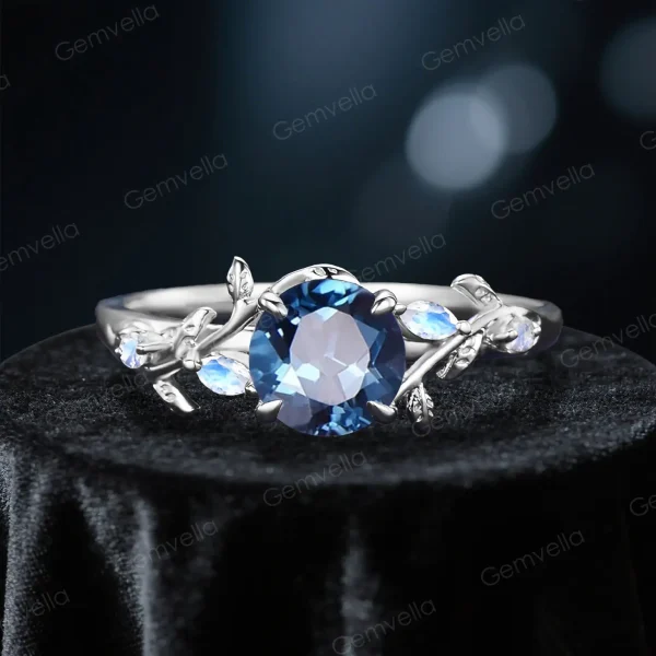 Sterling silver variant of the 1ct London Blue Topaz and Moonstone ring, showcasing the classic vintage design and round birthstone centerpiece in a polished silver tone.