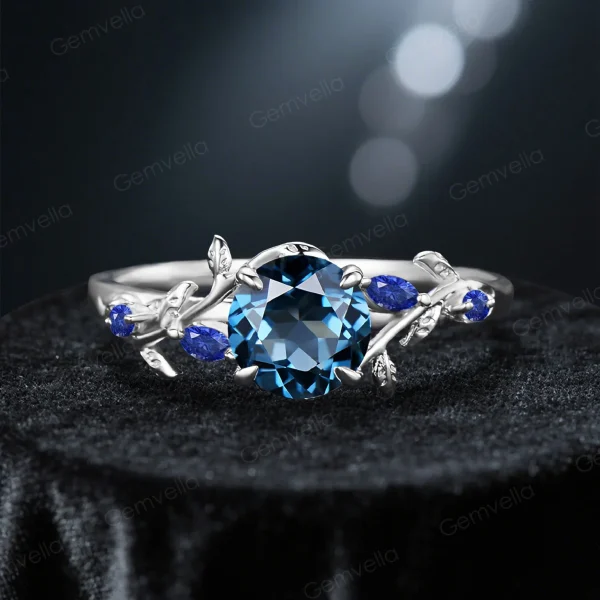 Sterling silver variant of the 1ct London Blue Topaz and Blue Sapphire ring, showcasing the classic vintage design and round gemstone centerpiece in a polished silver tone.
