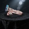 Side profile of 14k rose gold bridal set showing twisted twig vine texture, celtic knot details, and stone setting height.