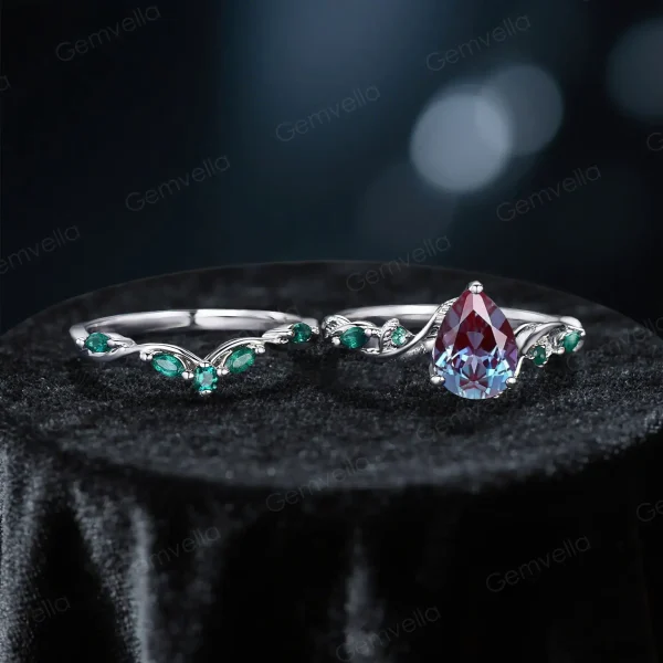 Flat lay image of the pear cut alexandrite ring displaying its full design and band details.