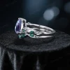 Side profile of the vintage alexandrite ring highlighting the gallery work and setting height.