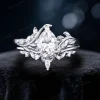 Budget-friendly sterling silver version of the 1.25ct pear moissanite bypass ring with leaf vine branch detailing, offering the same nature-inspired design and brilliant center stone at an accessible price point for brides seeking elegant silver bridal jewelry.
