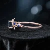 Side profile of the 1ct London Blue Topaz and Blue Sapphire ring, displaying the rose gold band thickness, prong setting height, and vintage-inspired metalwork details.