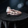 Side profile showcasing the twisted branch and leaf vine design of the 1.25ct pear cut moissanite engagement ring set, highlighting the band's nature inspired silhouette