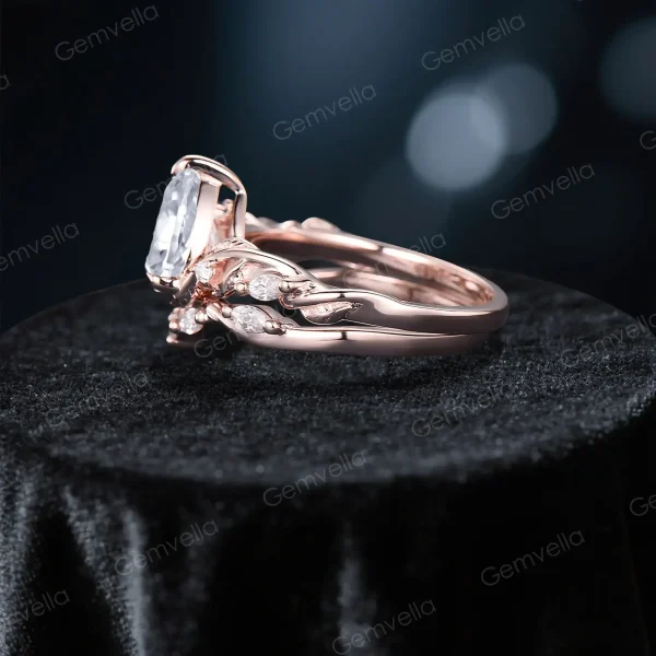 Side profile showcasing the twisted branch and leaf vine design of the 1.25ct pear cut moissanite engagement ring set, highlighting the band's nature inspired silhouette