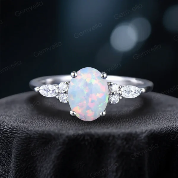 Front view of a unique 1.5ct Oval Opal and Marquise Moissanite engagement ring featuring a celestial design with sparkling gemstones, perfect as a handmade promise ring for her.