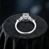 Top-down view of the 1.5ct Oval Opal and Marquise Moissanite ring displaying the symmetrical arrangement of the central opal and marquise accents, ideal for unique bridal jewelry.