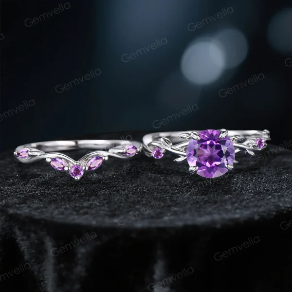 Flat lay photography of the two-piece ring set separated to show the detailed craftsmanship of the matching bands, highlighting the organic leaf patterns on both the engagement ring and the accompanying wedding band set entirely with Amethysts.
